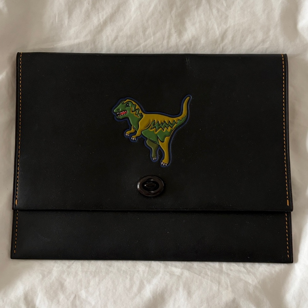 Coach novelty dinosaur leather envelope clutch